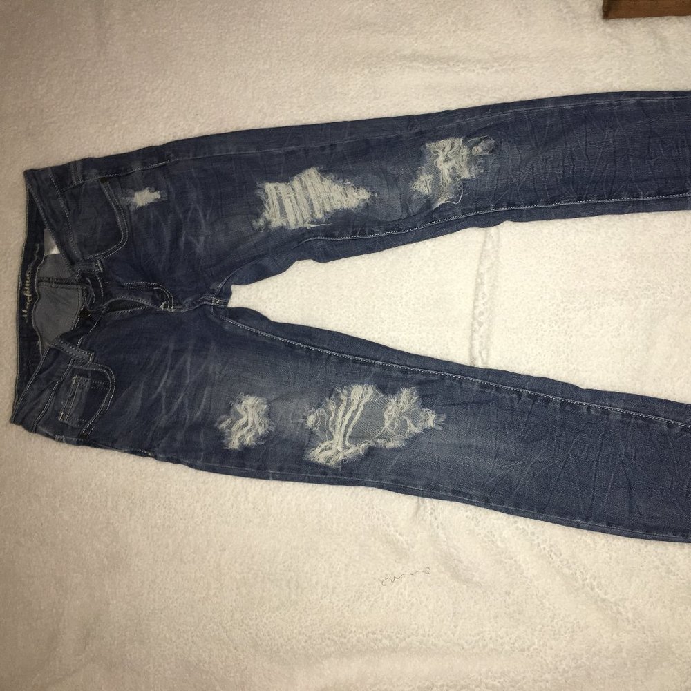 Medium washed ripped skinny jeans